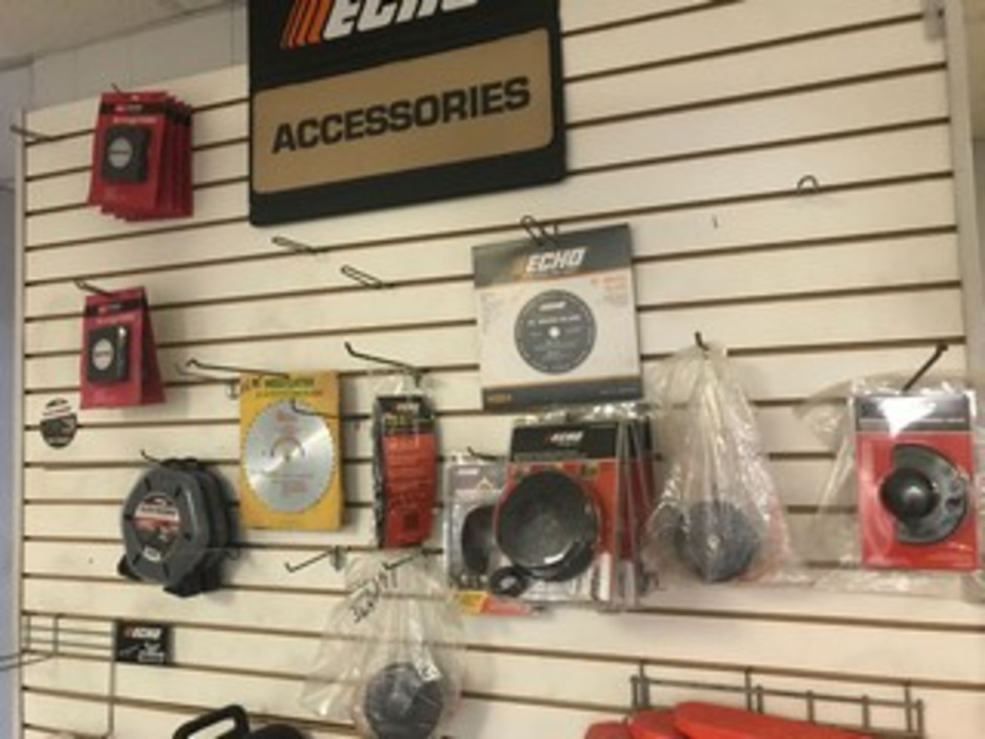 ASSORTED ECHO ACCESSORIES - GLOVES, TRIMMER HEADS, BLADES, LINES, ETC (CHAIN SAW NOT INCLUDED)