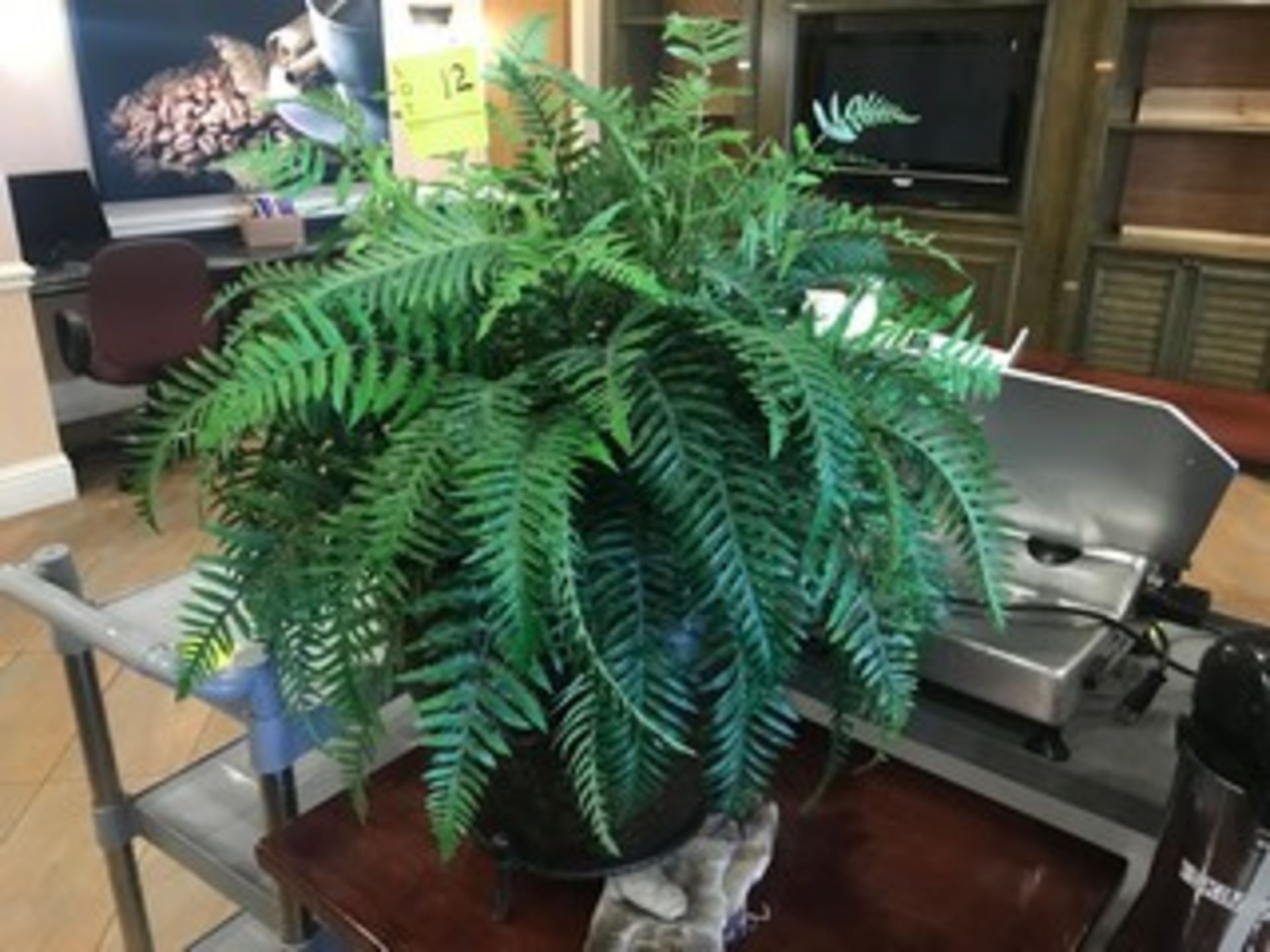 PLASTIC FERN IN DECORATIVE PLANTER