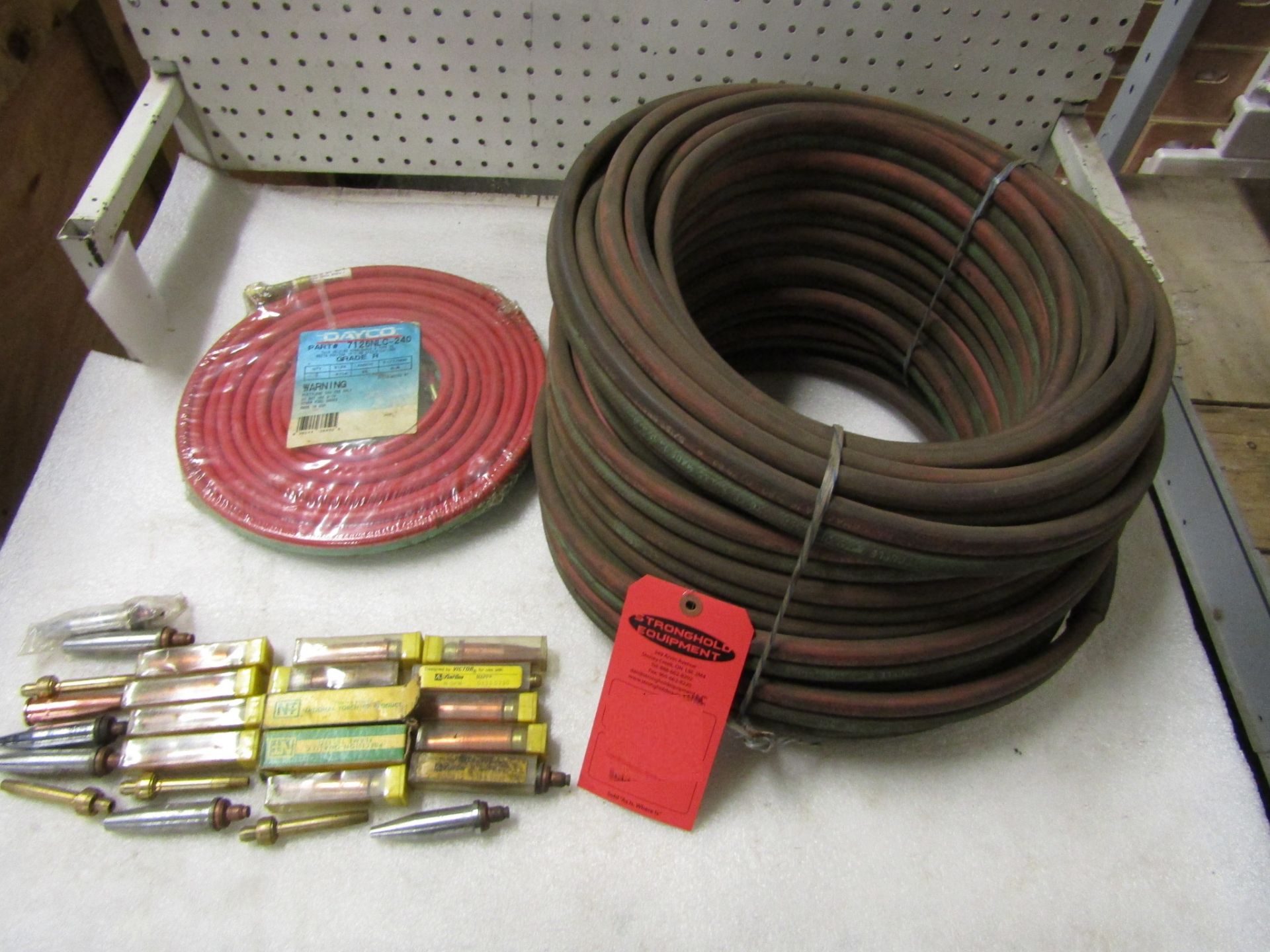 Lot of welding tips and hose