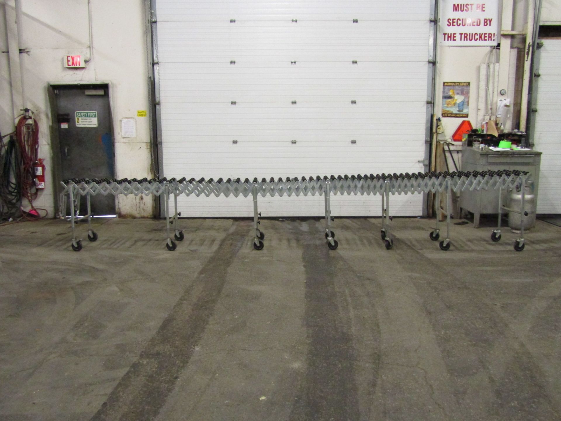 Roller Conveyor from 20' extendable conveyor down to 7'