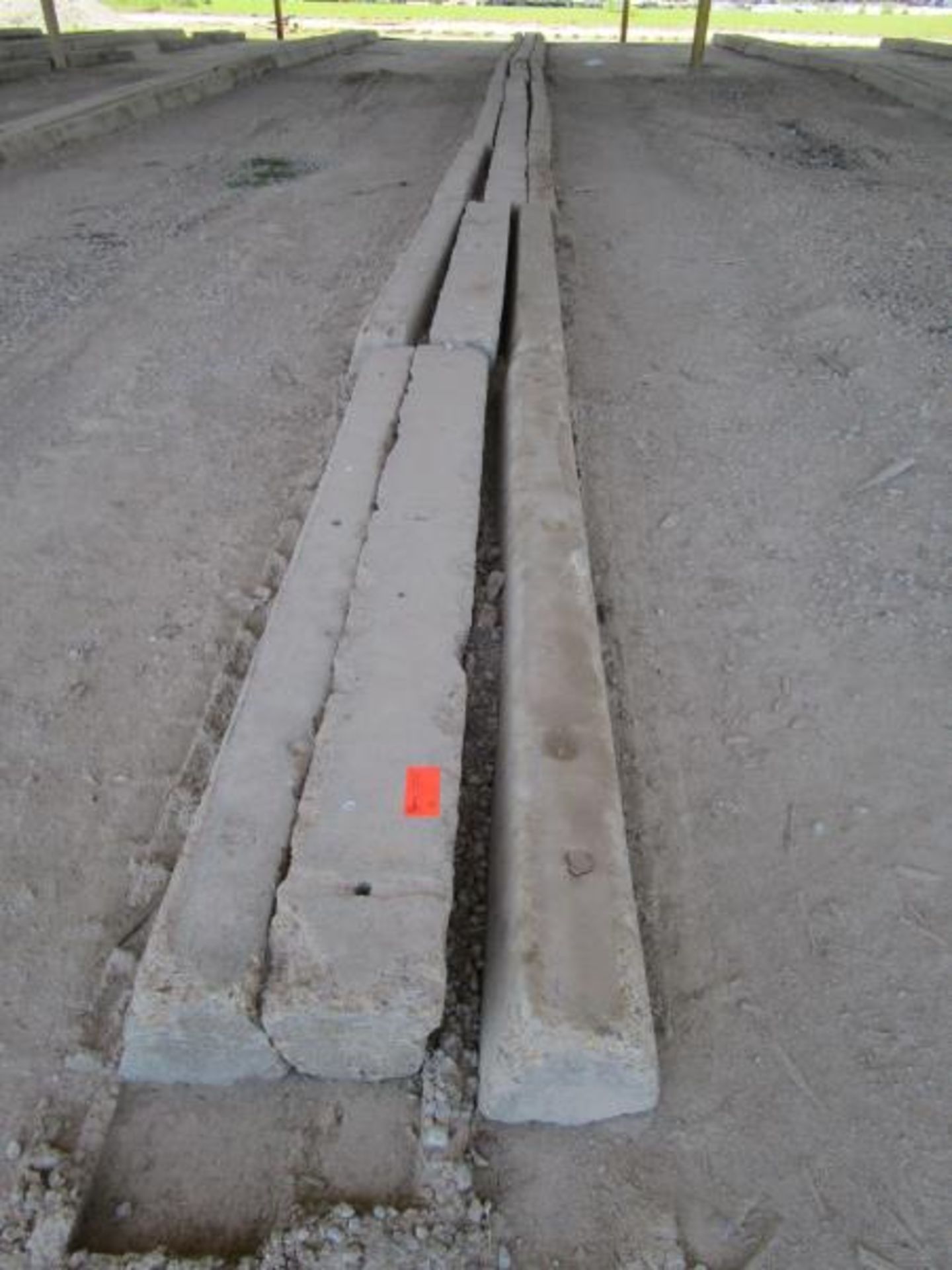 Approximately 30 Concrete Curbs