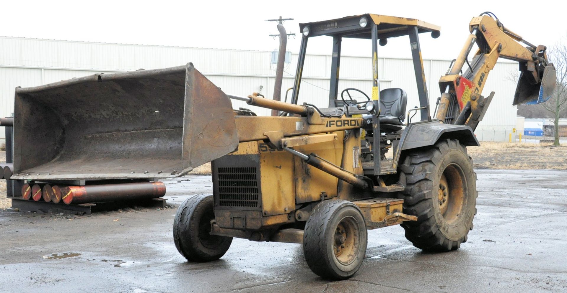 Ford/New Holland Model 555D Back Hoe, Torque Convert Transmission with Clutch Disconnect, 84" Smooth