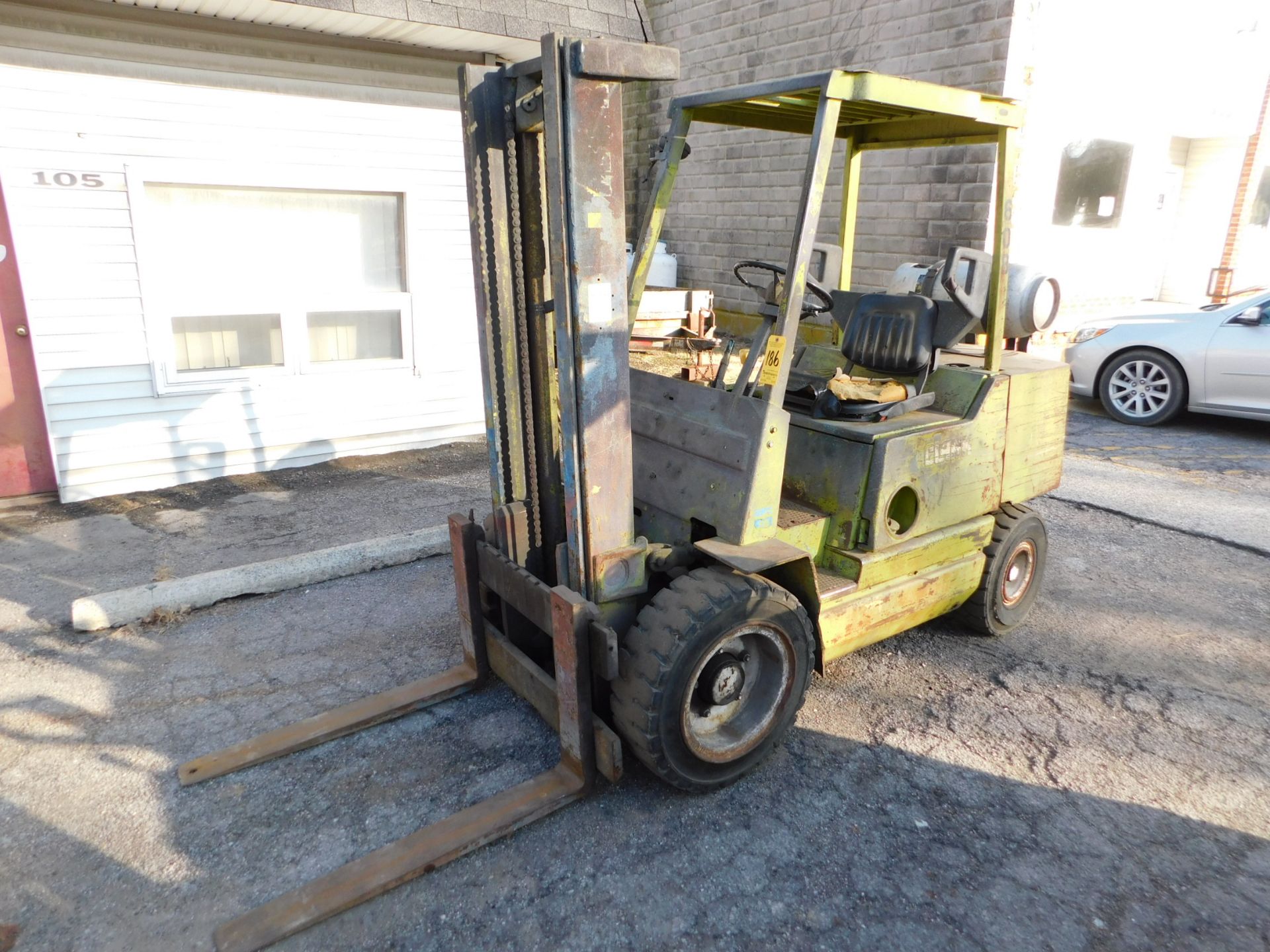 Clark Model GPX30E Fork Lift, s/n Unknown, 4,500 Lb. Capacity, LP, Hard Tire, Cage