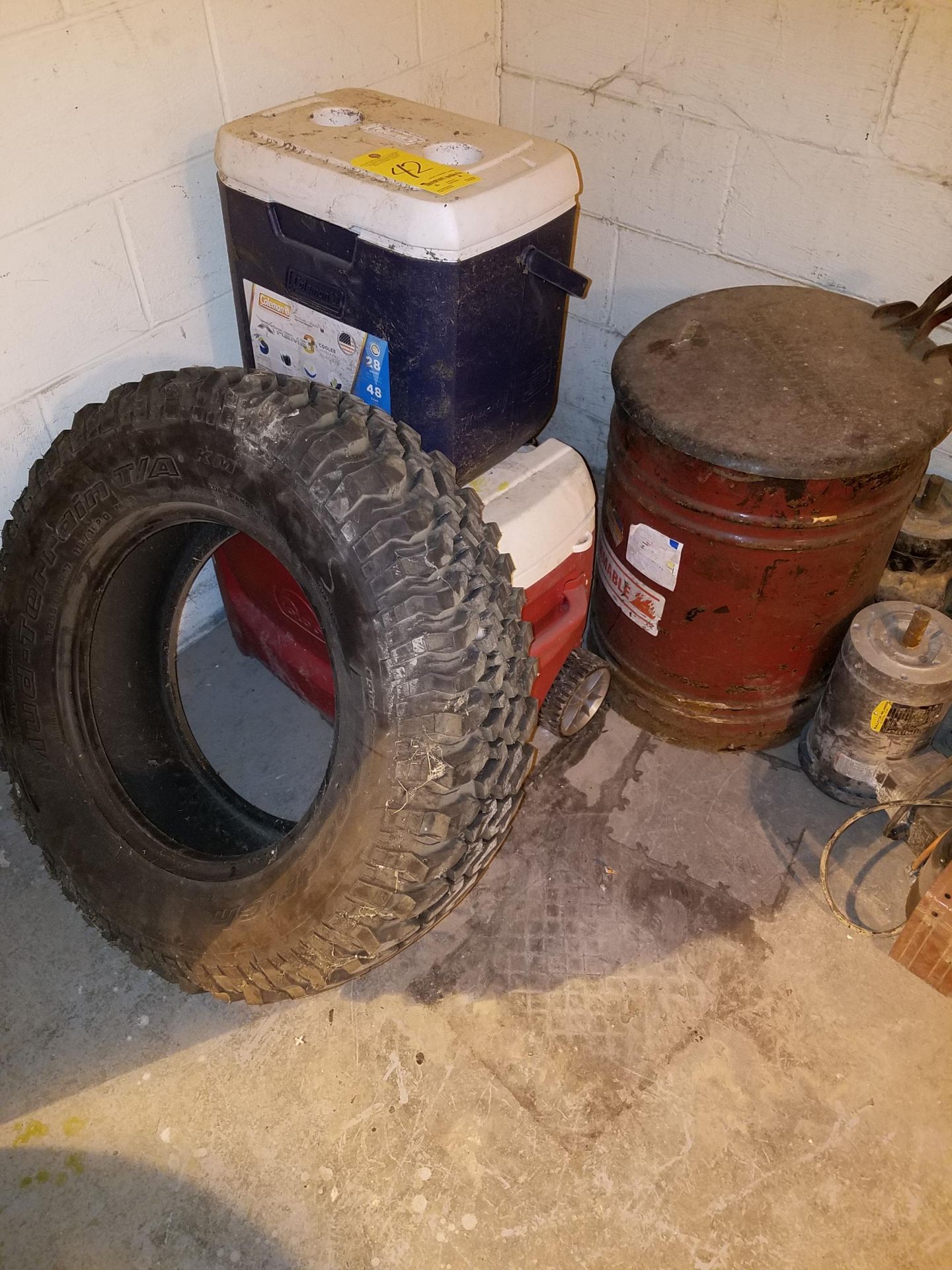 Contents of Corner (Oily Rag Can, Coolers & Snow Tire)