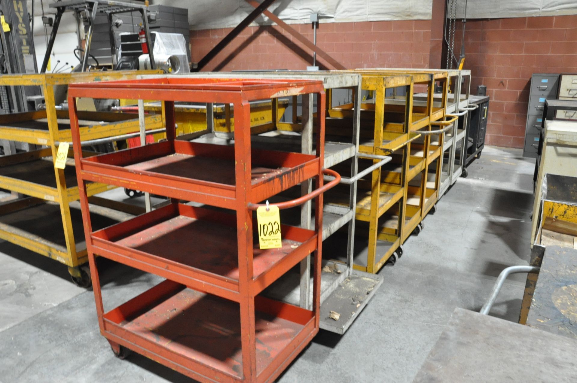 Lot-(7) 4-Tier Stock Carts in (1) Row