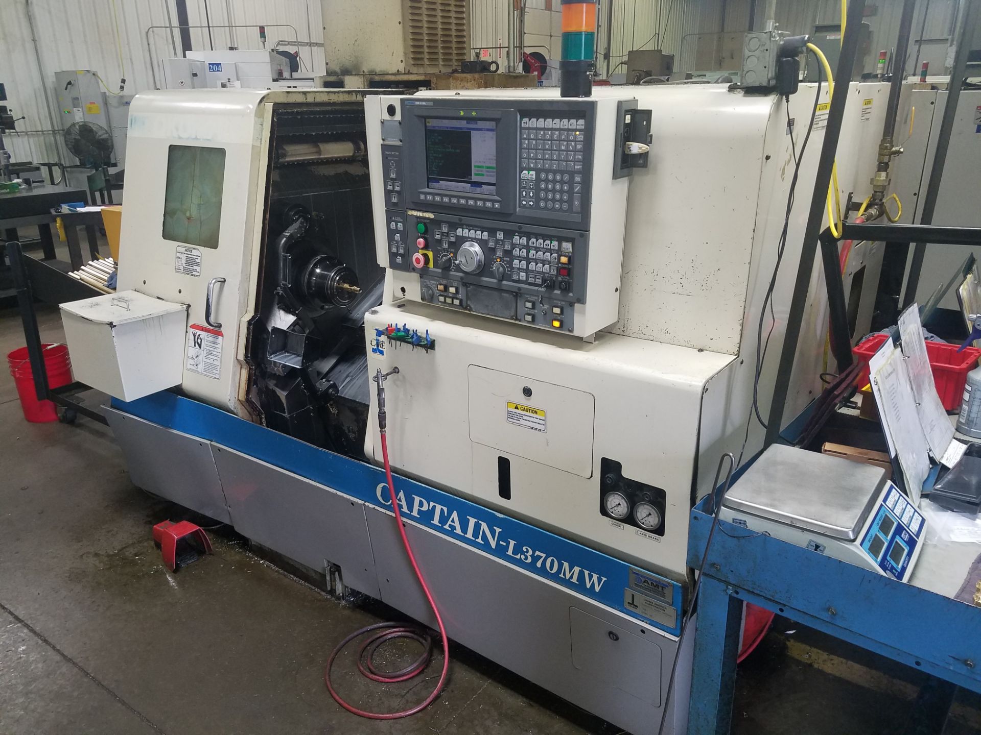 Okuma Captain L370MW CNC Turning Center, s/n 01-2002-0301, OSP-E100L CNC Control, Machine Series