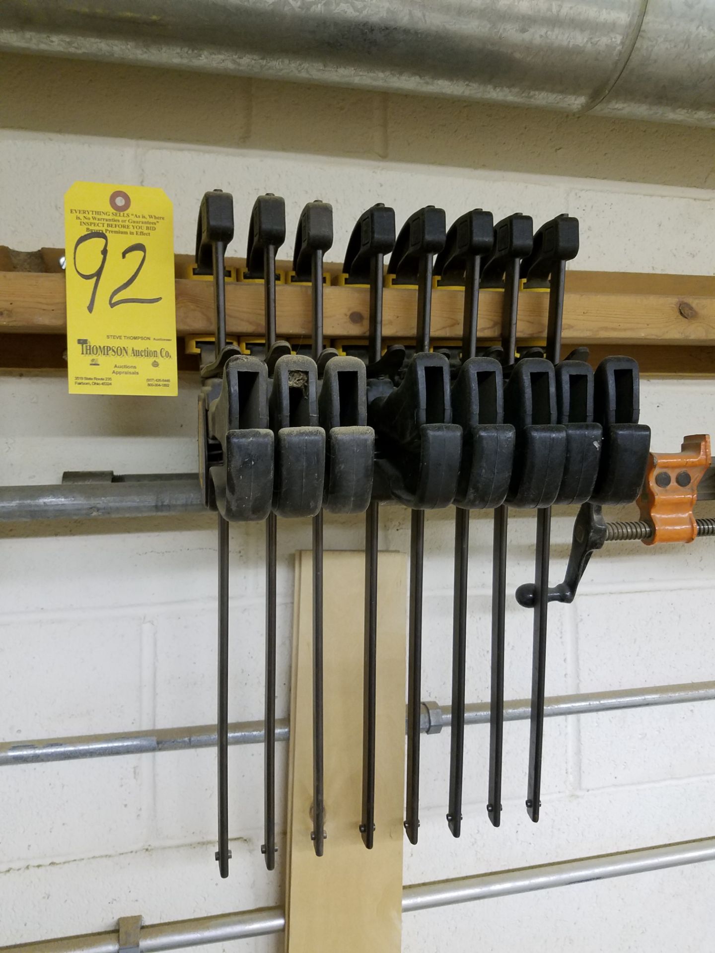 (8) Quick Grip Bar Clamps, 12 In., on Wall Rack