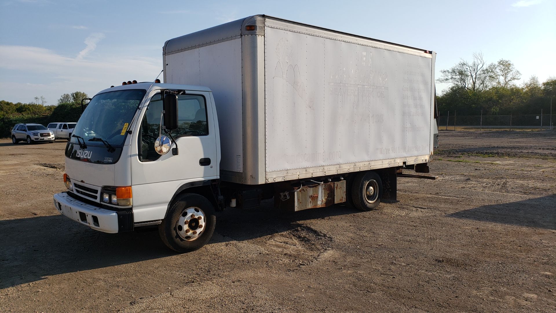 2002 Isuzu Super Lawn Truck Isuzu Turbo Diesel, 16 ft. Box, Hydraulic Ramp Door, Interior Storage