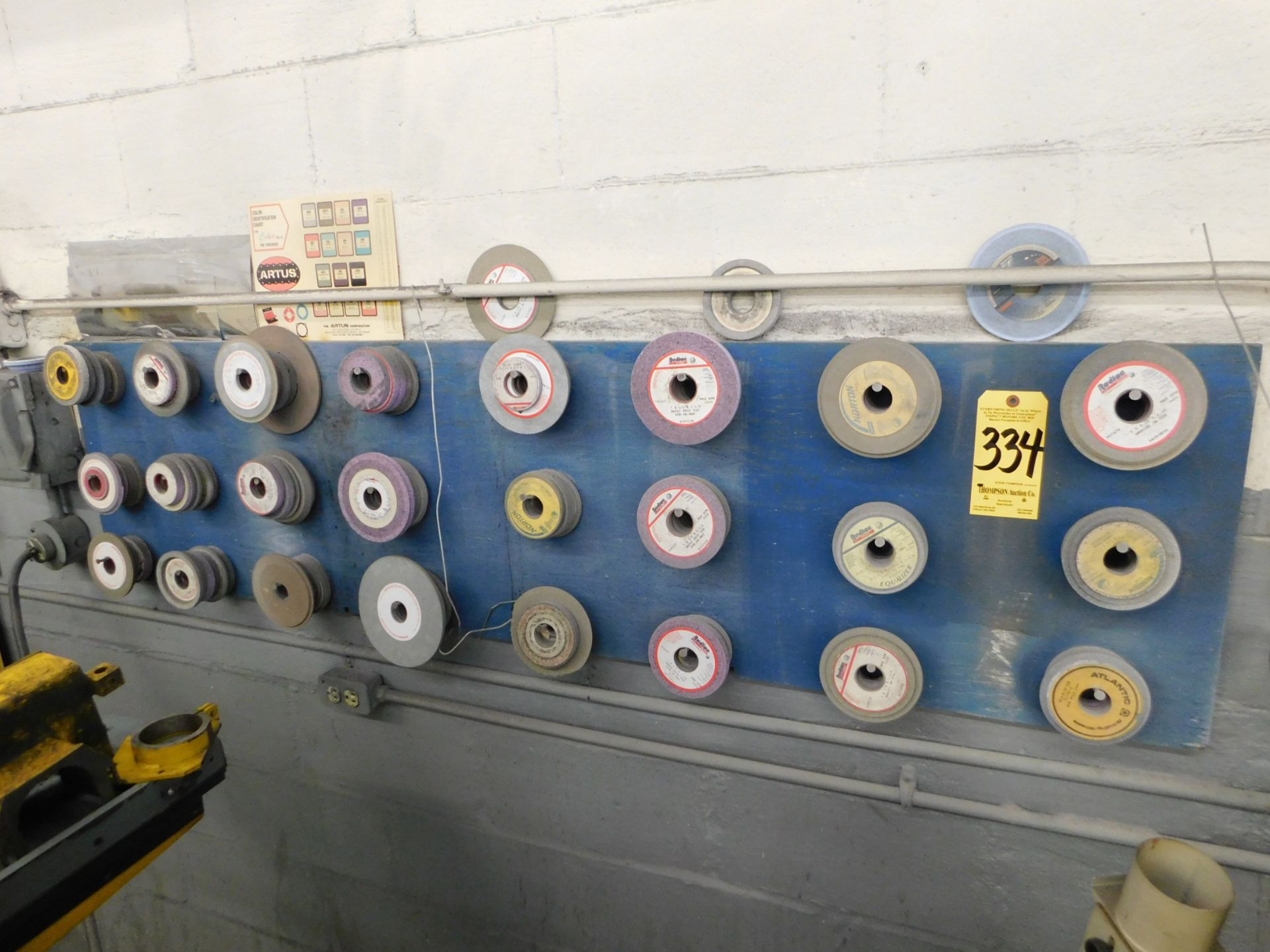 Contents of Grinding Wheels on (3) Wall Racks