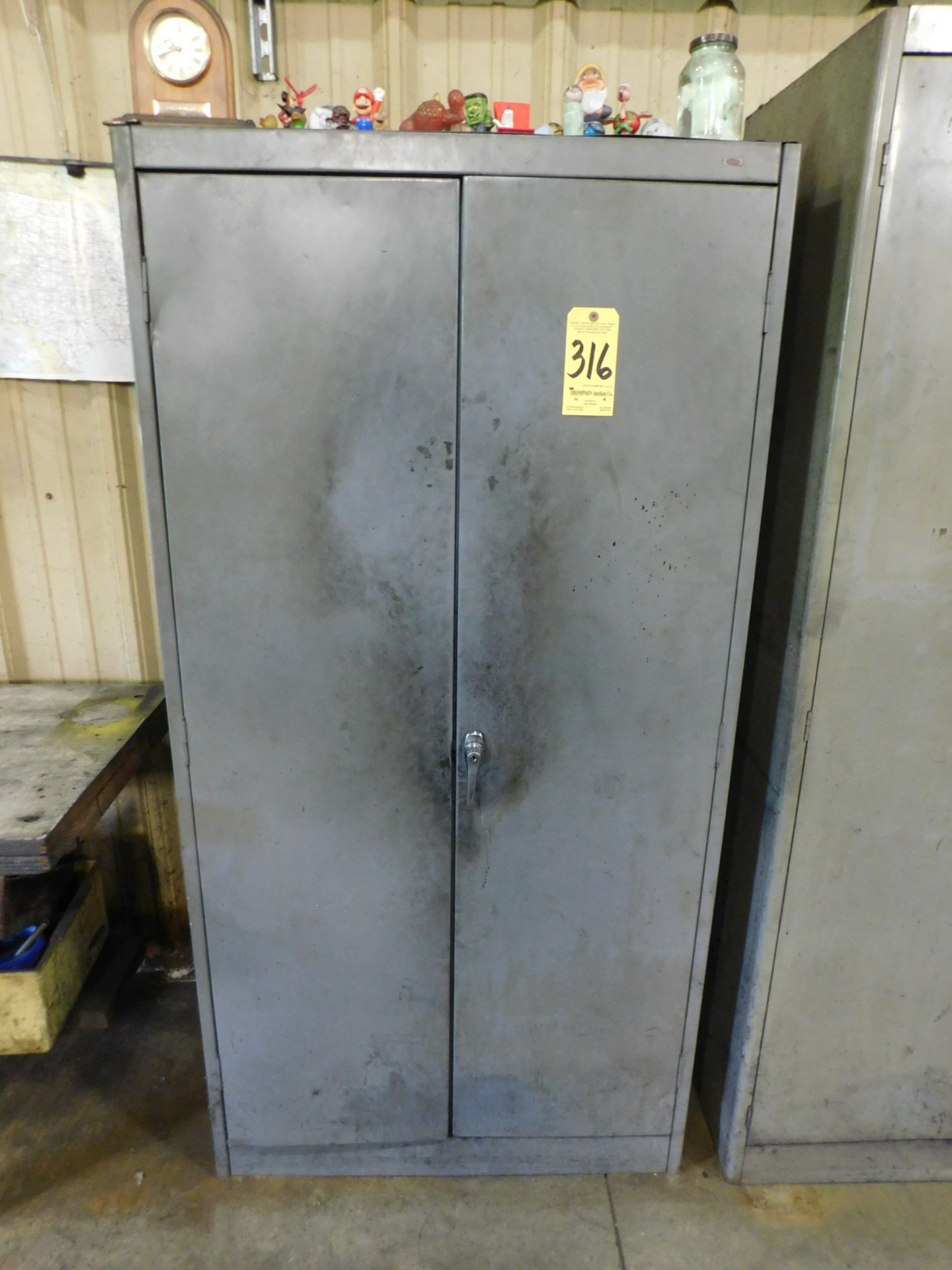 2-Door Metal Upright Storage Cabinet and Contents