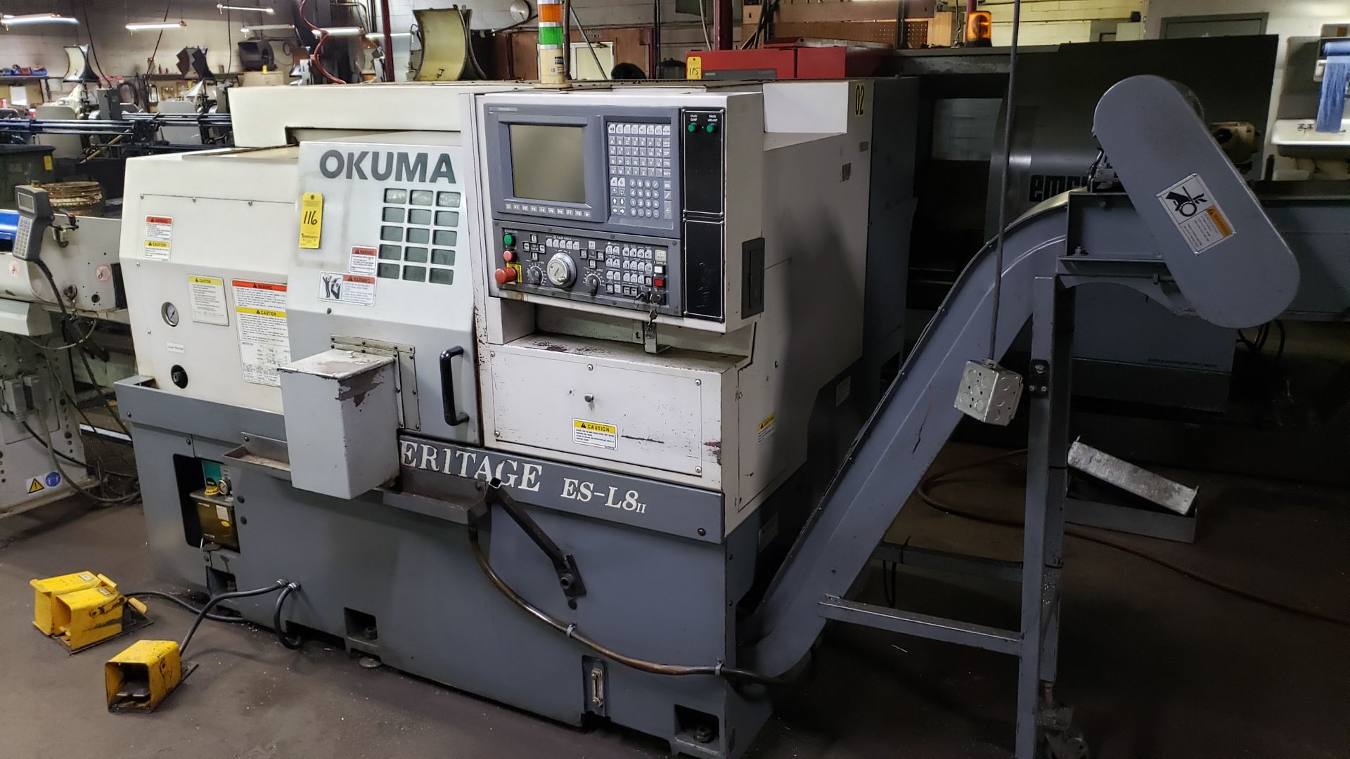 Okuma Heritage ESL8II CNC Lathe, OSPU10L Control, 12 ATC, Chip Conveyor, w/ IEMCA Bar Feeder - Image 15 of 21