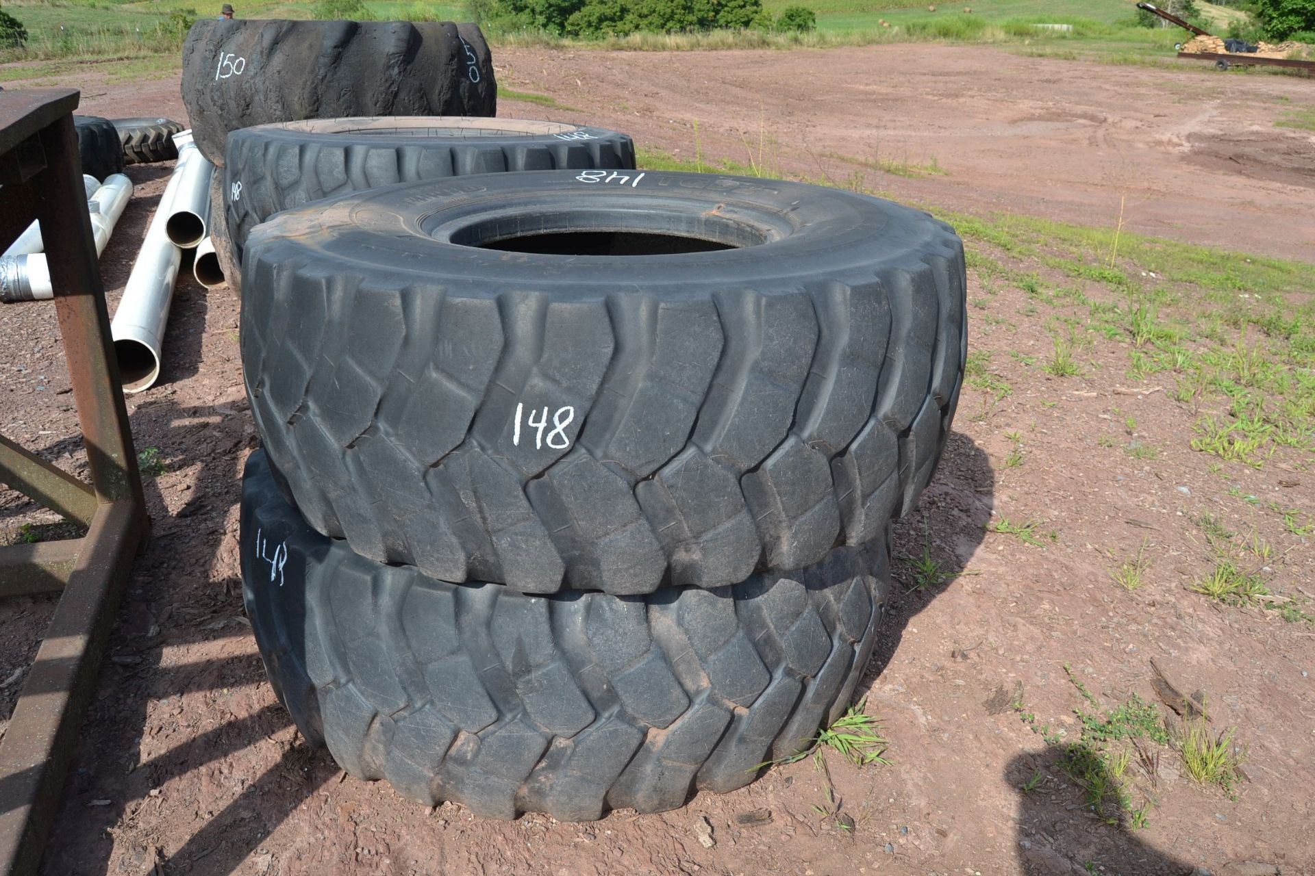 (4) 20.5X25 LOADER TIRES