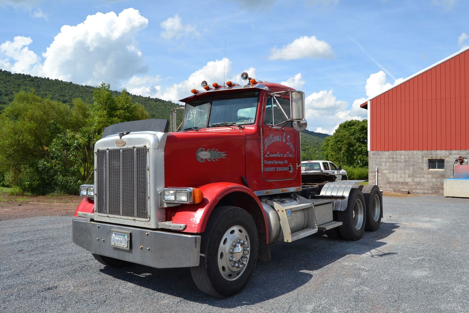 1999 PETERBILT 378 DAY CAB ROAD TRACTOR W/ 60 SERIES DETROIT ENGINE 500 HP W/ 10 SPEED TRANS W/ ALUM