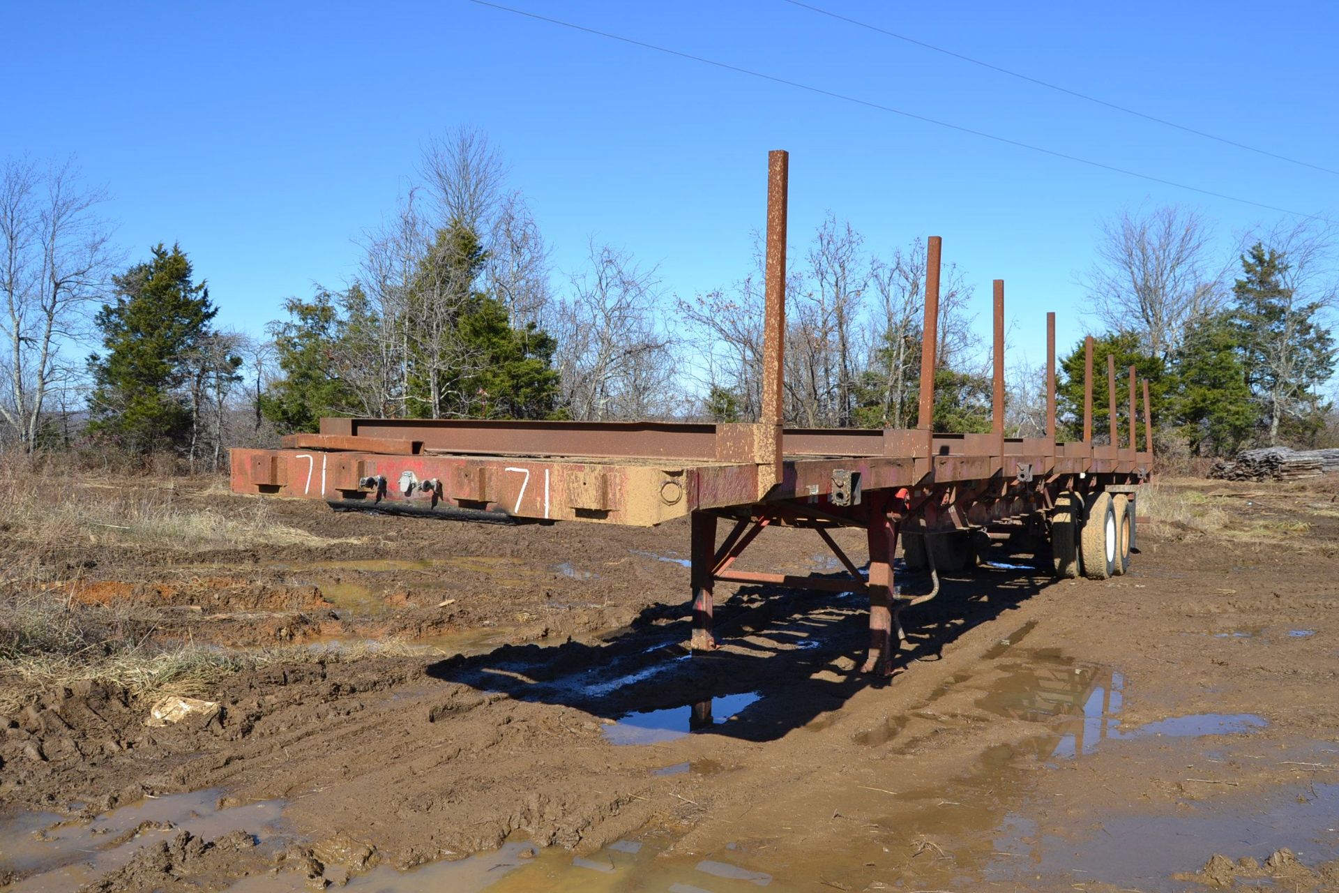 40' FLATBED TRAILER W/ LOG BUNKS W/ LOG BUNKS