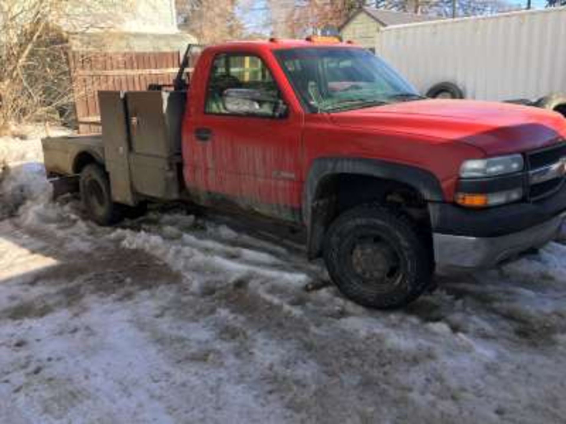 2002 Chev 3500 truck, 6 lit., Gas, auto, air,tilt, 4x4, flatdeck w/5th wheel hitch and tool boxes,