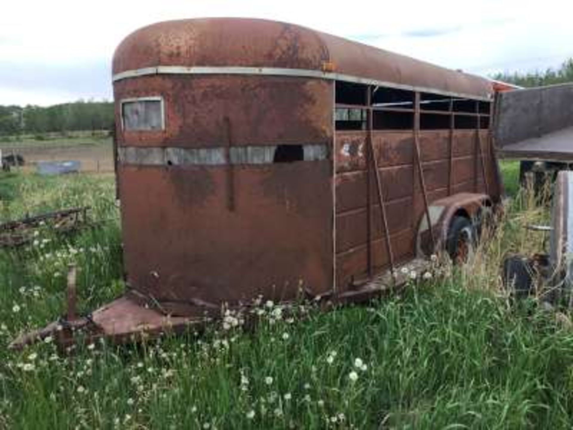 16 foot stock trailer, tandem axle, bumper hitch (needs repairs)