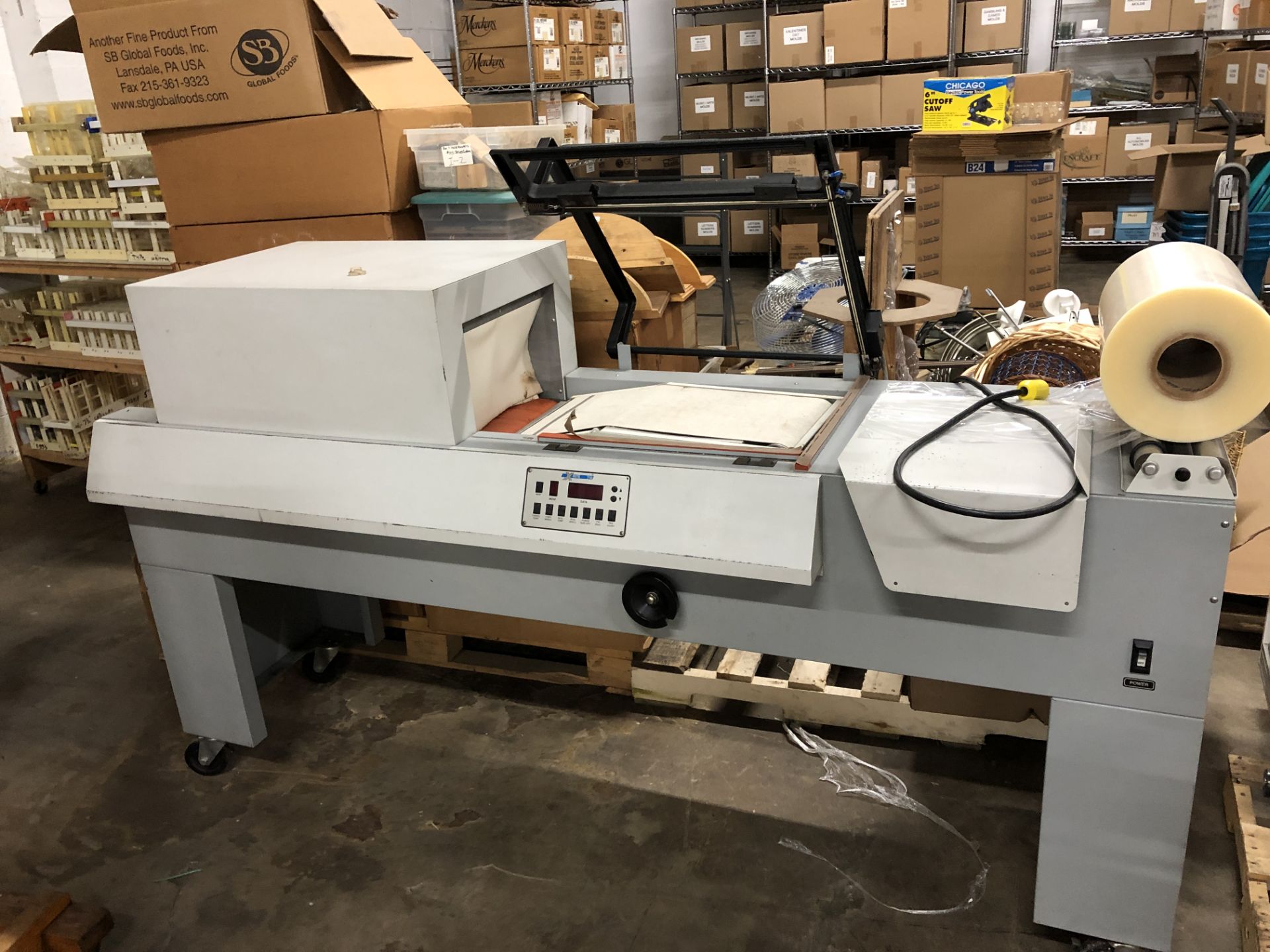 X-Rite model 710 L-Bar Sealer with Shrink Tunnel. 14" x 18" L-bar area and 14" wide x 8" tall and