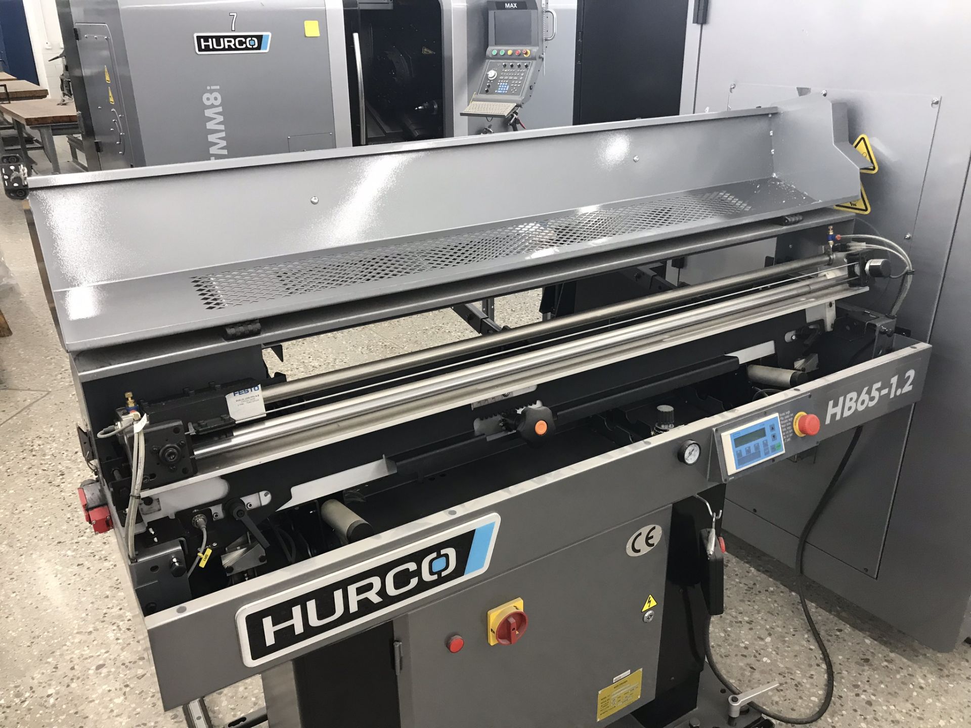 Hurco CNC Slant Bed Lathe TM6i with Barfeeder New 2013 Located at Warren, Michigan Warehouse - Image 5 of 12