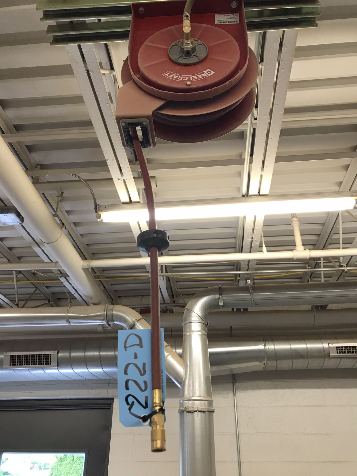 Hose Reel on Ceiling in Wood Shop (Must Remove)