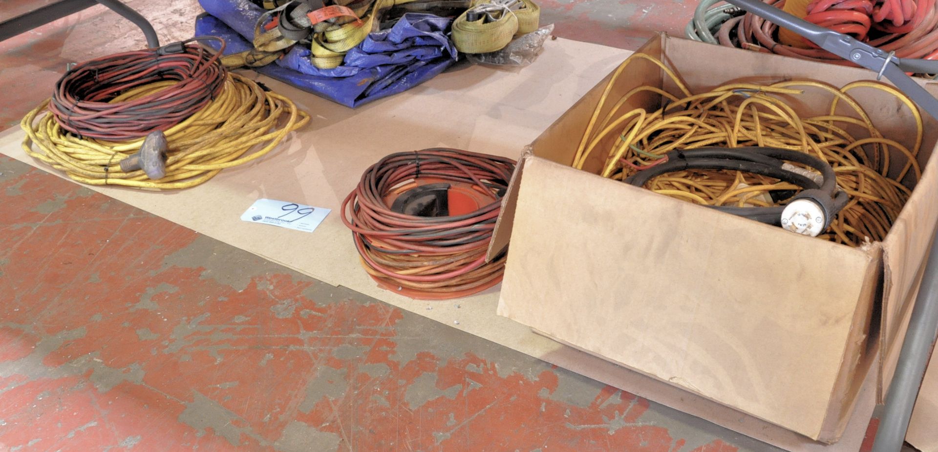 Lot-Extension Cords Under (1) Table