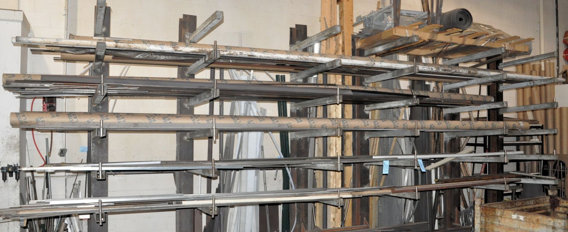 Lot-Various Steel and Stainless Metal Stock on Face Side of Cantilever Rack