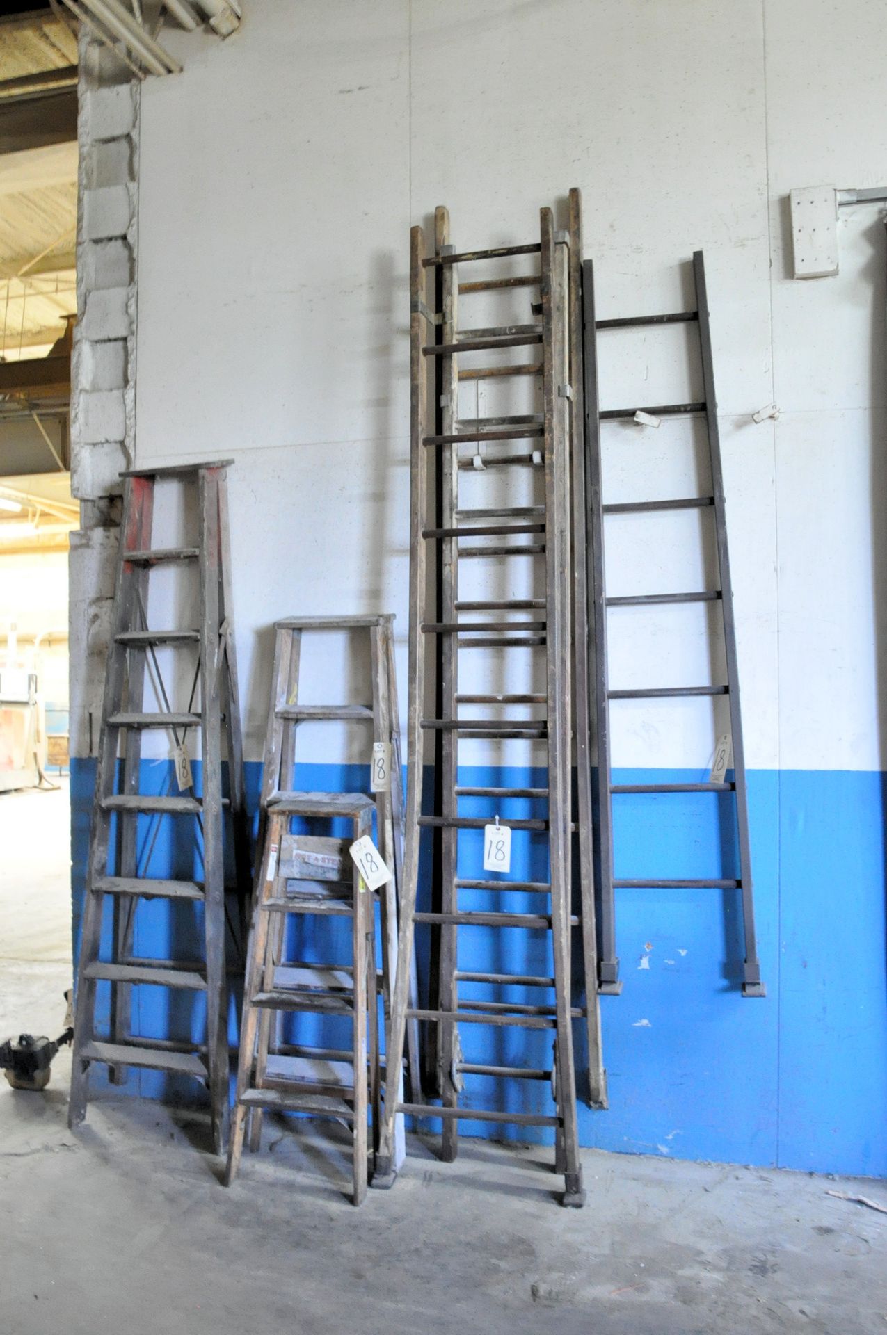 Lot-(2) 20' Wood Extension Ladders, (1) 8', (1) 6' and (1) 4' Wood Step Ladders