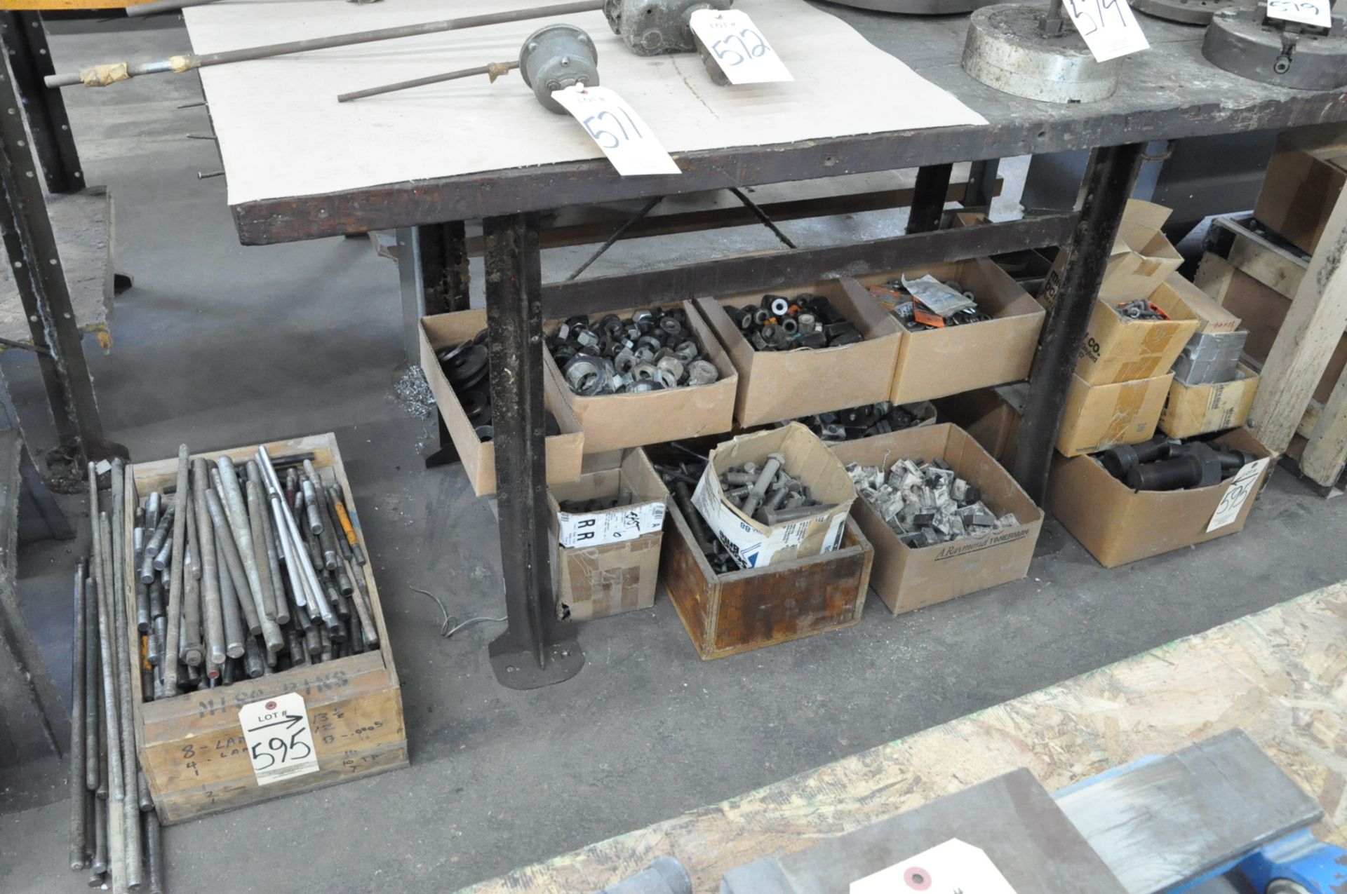 Lot-Hold Down Setup Bolts, Nuts and Washers in (12) Boxes and (1) Crate Under (1) Bench