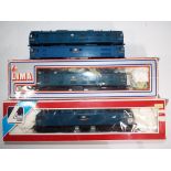 Model Railways - Tri-ang OO gauge - two Class 77 electric locomotives in associated boxes with two
