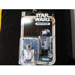 Star Wars - R2-D2 figure in mint blister pack by Kenner.