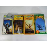 Grenadier Models - Four white metal dragon kits, unassembled and unpainted,