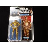 Star Wars - C-3 PO figure in original blister pack, by Kenner in mint condition.