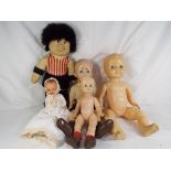 Vintage dolls - five dolls comprising three footballing dolls, a ceramic dressed doll and unnamed,