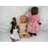 Vintage dolls - four dolls comprising black doll with earring and jointed limbs,