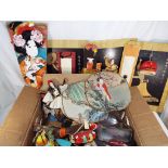Vintage Asian dolls - in excess of 40 dolls, along with a selection of oriental fans,