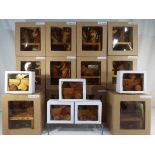 Fourteen unused novelty wooden carved bears also including five wooden carved ducks,