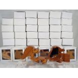 Forty nine unused novelty carved wooden turtles opening into trinket boxes