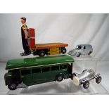 Tri-ang, Timpo and others - four vintage tin-plate vehicles,