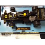 Scalextric - a John Player Special F1 racing car #C050 in near mint condition in original box with