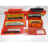 Model Railways - ten boxes of Tri-ang American and Canadian locomotives and rolling stock