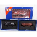 Model railways - three pieces of O gauge rolling stock comprising Heljan Mobil Charringtons red B