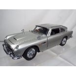 Danbury Mint - a limited edition James Bond Aston Martin DB5 in 1:24 scale,