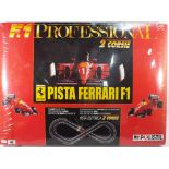 Polistil - a Ferrari F1 slot car racing set still sealed.