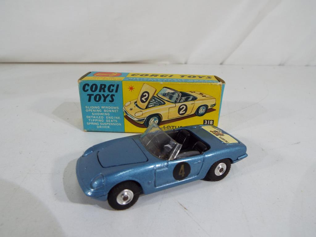Corgi Toys - a diecast model Lotus Elan S2, metallic blue body, black interior, spun wheel hubs,