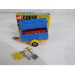 Corgi Toys - Pennyburn Workmen's Trailer # 109 in blue and yellow, hinged twin lids with pick-axe,