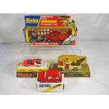 Dinky and Corgi - four diecast vehicles in original boxes comprising #202 Fiat Abarth 2000,