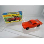 Matchbox - a rare Ford Mustang with red interior and burnt orange body,
