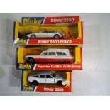 Dinky - three diecast in original window boxes comprising #180 Rover 3500,