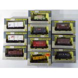 Model Railways - Wrenn oo gauge 10 wagons in original boxes, comprising W4630, W4635p, W5001,