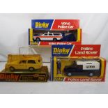 Dinky - three diecast vehicles in original boxes comprising #243 Volvo Police Car (missing signs),
