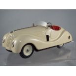 Schuco - #4001 Examico, cream tinplate clockwork unboxed car with four speed and reverse gears,